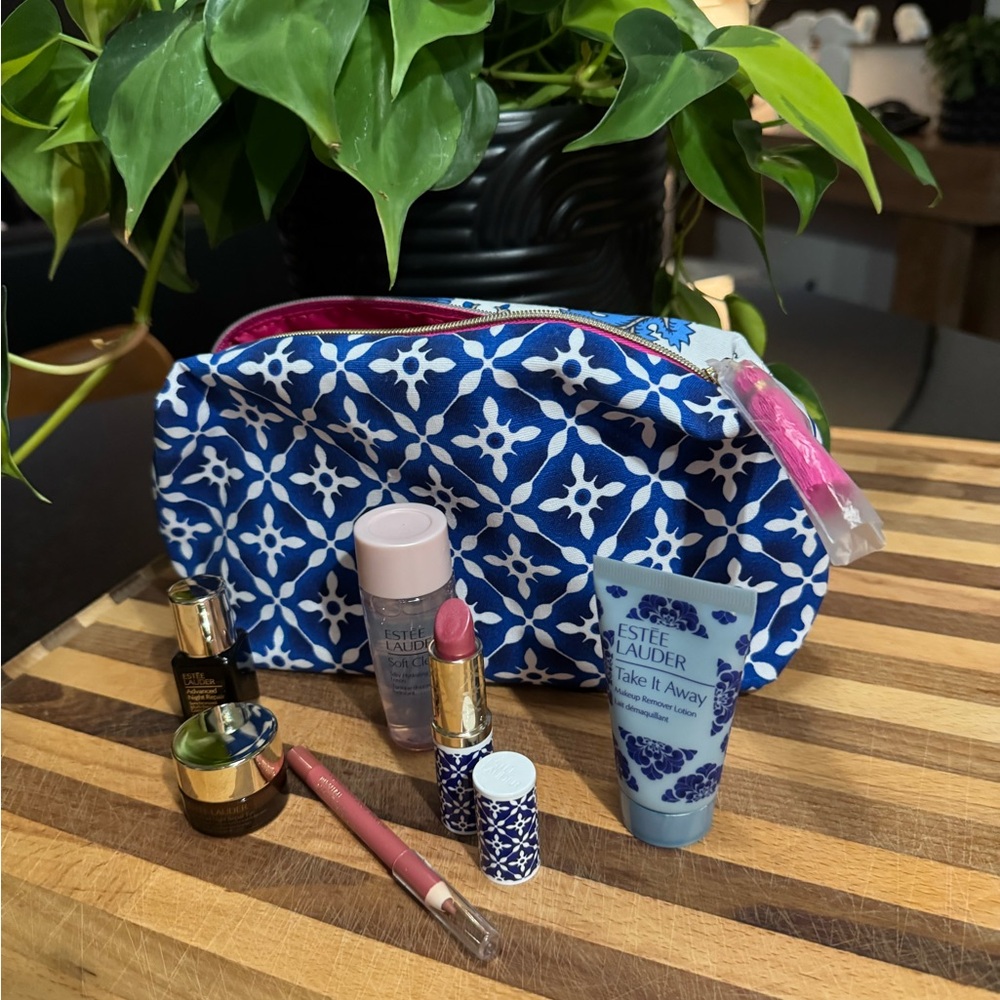 Blue and White Cosmetic Bag with Estee Lauder Products